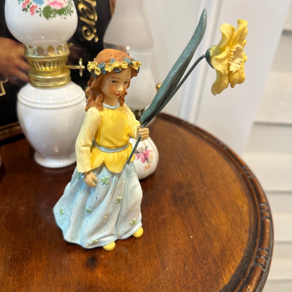 Wild flower Angle
Maiden Figurine with Yellow and Blue Accents